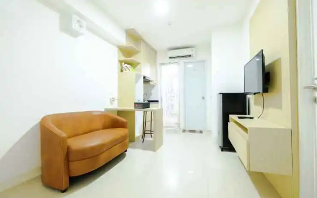 Minimalist & Clean 2BR Bassura City Apartment By Travelio