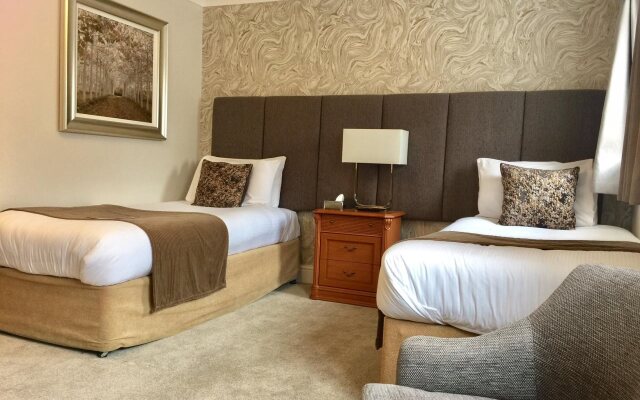 De Rougemont Manor Hotel & Suites