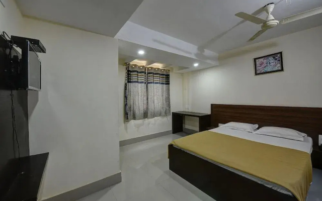 SPOT ON 37153 Karavali Paradise