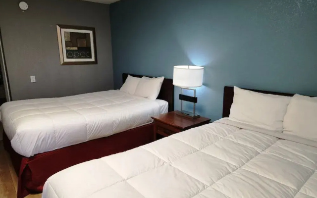 Executive Inn By OYO Queenville Mena