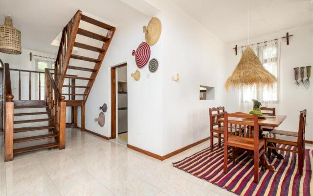 KIMA Serviced Beach House & Suites