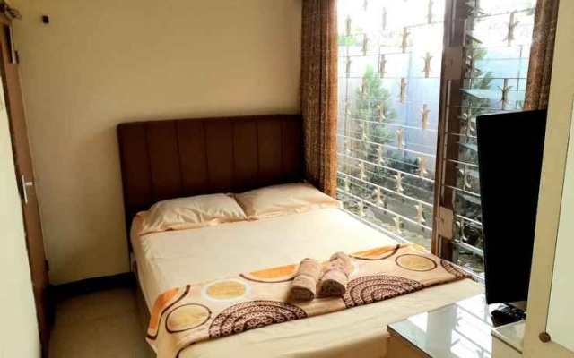 Gio Guesthouse near Terminal Baranangsiang – Guest Rooms – Bogor