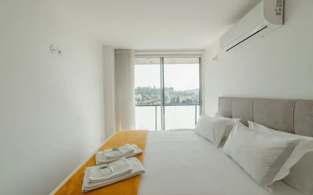 Amazing Riverview Apartment w Pool by Vacationy