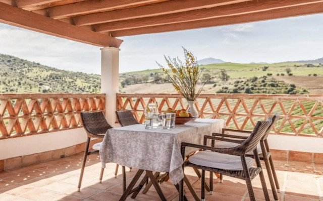 Casa Grande / Rosas Cantares