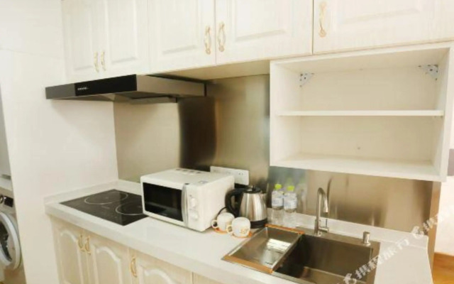 Qingdao Sihai Jiuzhou Hotel (Wuyue Plaza pengpaidao store)