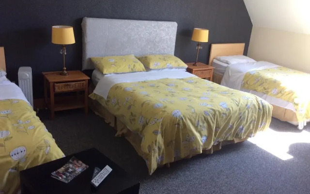 Coach House Suites