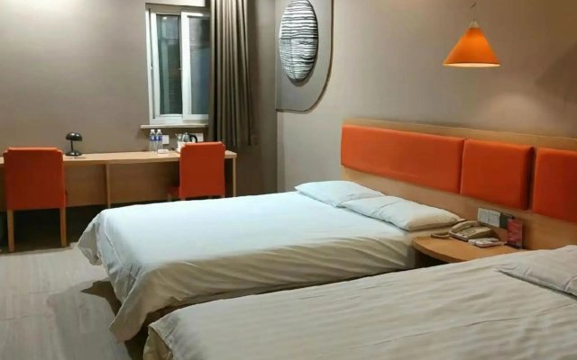 Yijia Hotel (Xinyi Railway Station Nanjing Road)