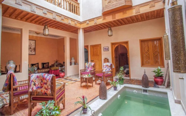 "room in Guest Room - Riad Lakouas Triple Room With Pool View"