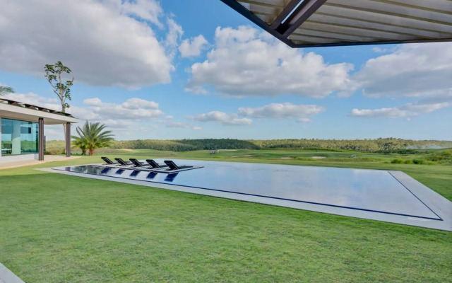 Modern 7BR Villa w Stunning Views of Golf Course