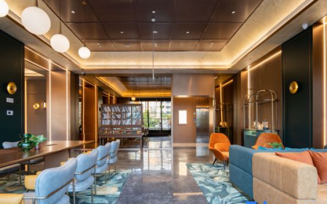 Orange Hotel (Yibin West Railway Station WanXiang World)