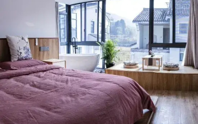 Tiantai Happiness Inn