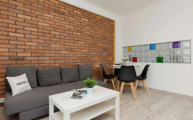 Rondo Wiatraczna Apartment by Renters