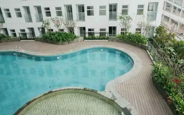 Cozy and Chic Studio at Serpong Garden Apartment By Travelio