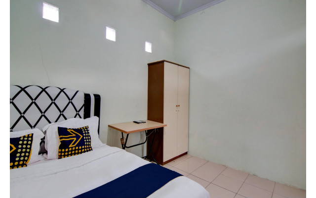 Hotel O Awi Stay Syariah Near SIMPANG KAWASAN INDUSTRI WILMAR PELINTUNG – Guest Rooms – Pelintung