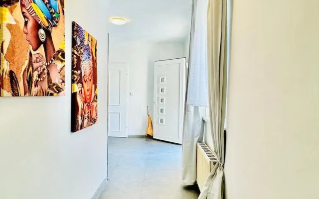 Affordable 4BR Apt Walk to FAC Platz