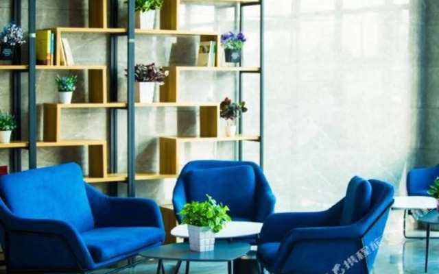 Junyi Hotel (Yichuan Huamei Building Materials City)
