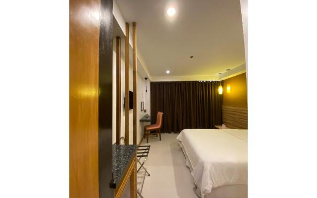 Capital O 820 Guijo Suites Makati