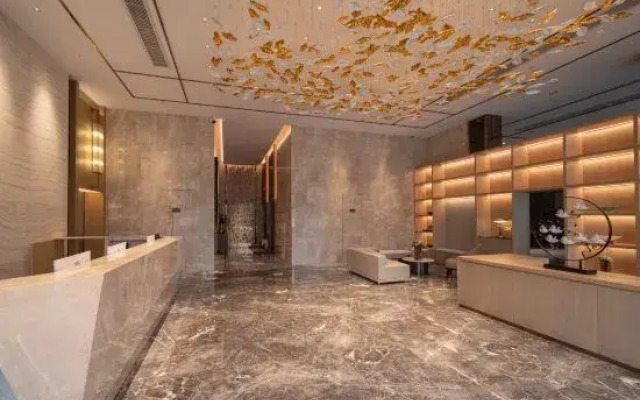 BaiLiQuanZhiJiuDian Hotel (Jiangmen Binjiang Sports Center)