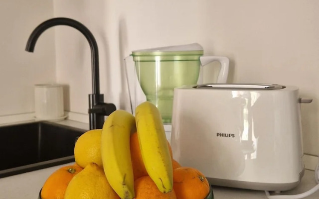 Moderno Bilocale con Terrazzo e Parcheggio