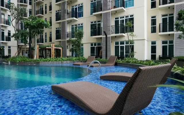 Modern 1BR Apartment at Puri Orchard