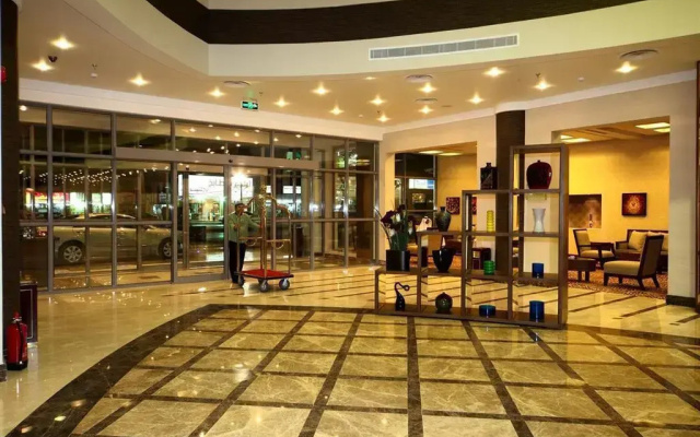 Golden Tulip Suites Breida Al Q