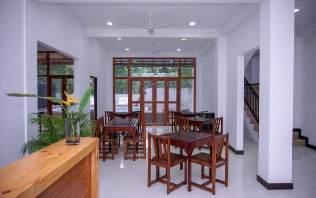 Sea Cloud Dalawella by OYO Rooms