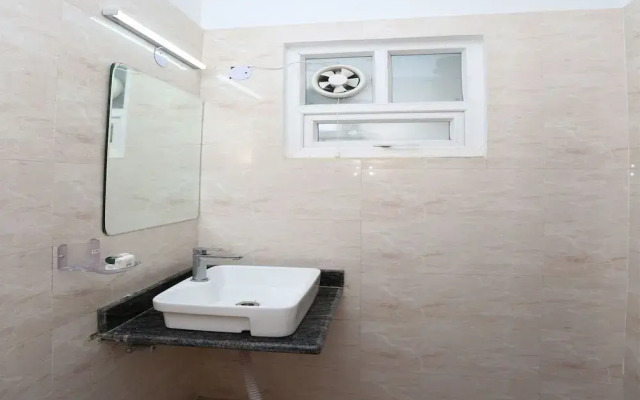 OYO Flagship 12081 Palm Garden Suites