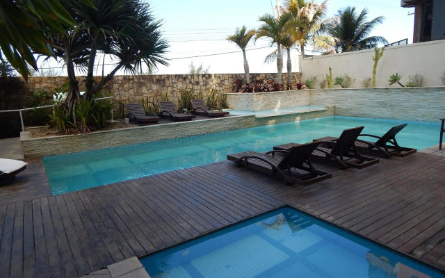 Mandai - Apartamento vista Lateral para o mar com piscina