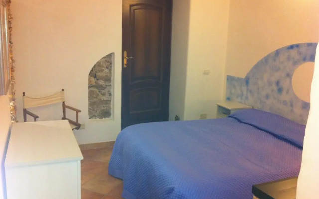Apartment With 2 Bedrooms in Cugnana, With Pool Access, Terrace and Wifi