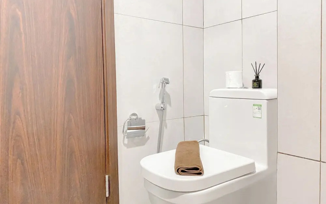 Simple White Designed Studio At Lrt City Bekasi Apartment