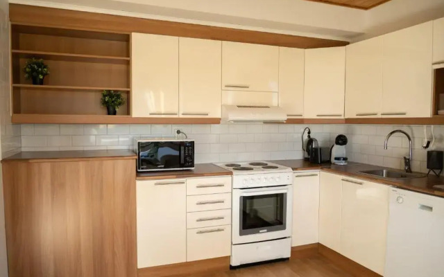 Design apartment with lake view, sauna, fireplace