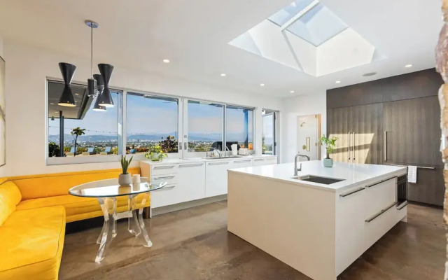 Stylish Hillside Retreat with Pool & Views