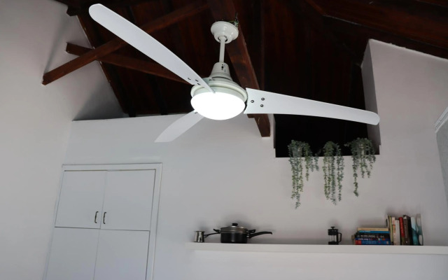 Mediterranean poolside garden cottage