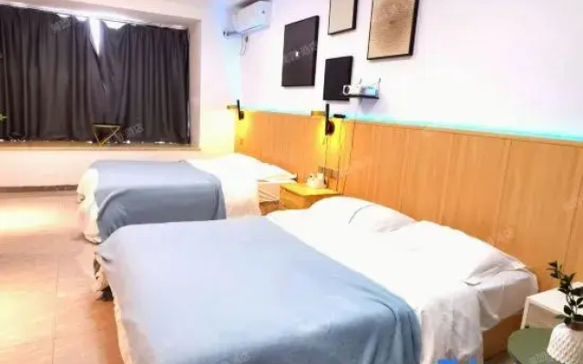 Qiya Art Homestay (Zhongshan Tianyi International Plaza)