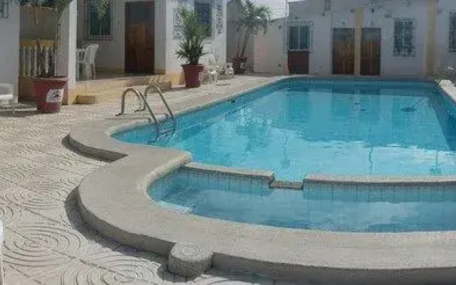 Hostal Palmeras Playa Milina