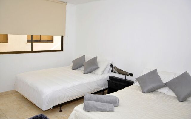 Отель Axis Inn by GEH Suites