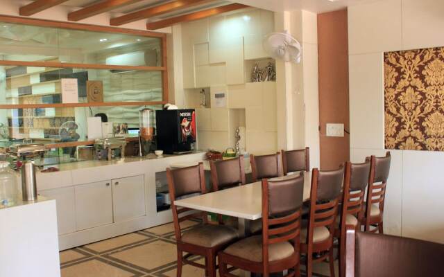 Capital O 419 Hotel JPS Residency
