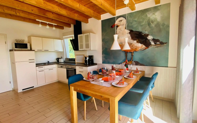 Ferienhäuser mit Seeblick direkt am Plauer See