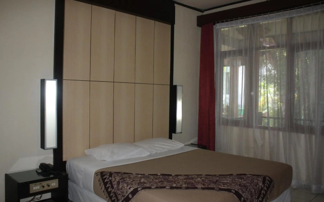 Puri Naga Beachfront Cottages