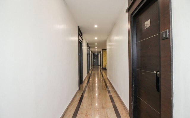 Capital O 15964 NI Ambaari Suites