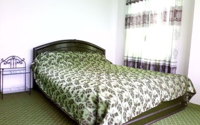 OYO 135 Lost Garden Apartment and Guest House