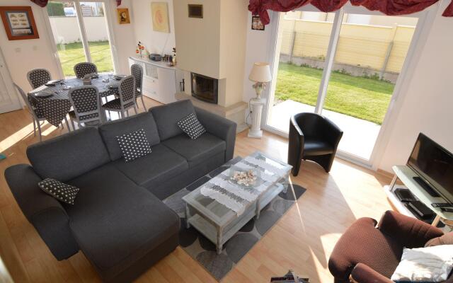 Modern Holiday Home In Denneville with Garden