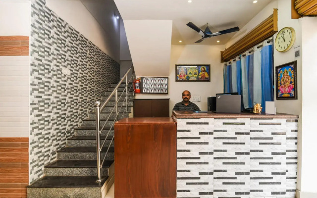 Varsha Grand Residence by OYO Rooms