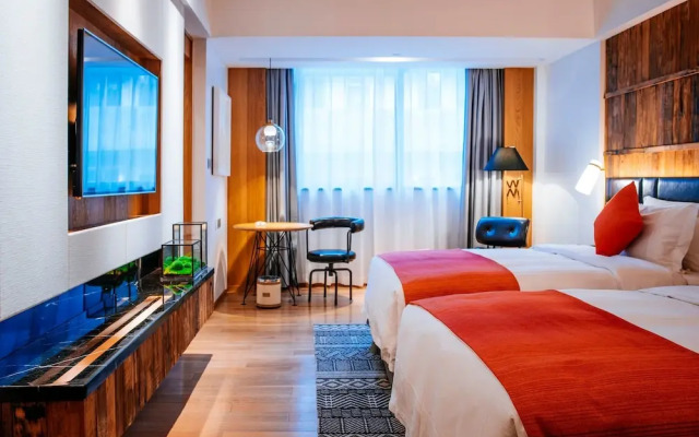 QI Hotel