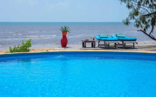 Saadani Safari Lodge - bush, river, beach