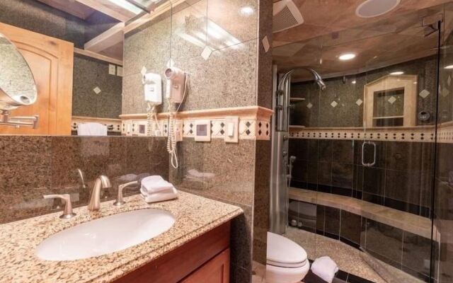 Nine Vail Road Condos in Vail Village with Onsite Pool by RedAwning