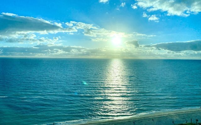 Direct ocean front condo Miami Beach