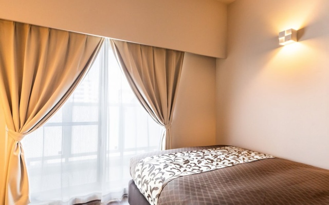 Mr.KINJO in VIOLETTE East Town 2 – Guest Rooms – Naha