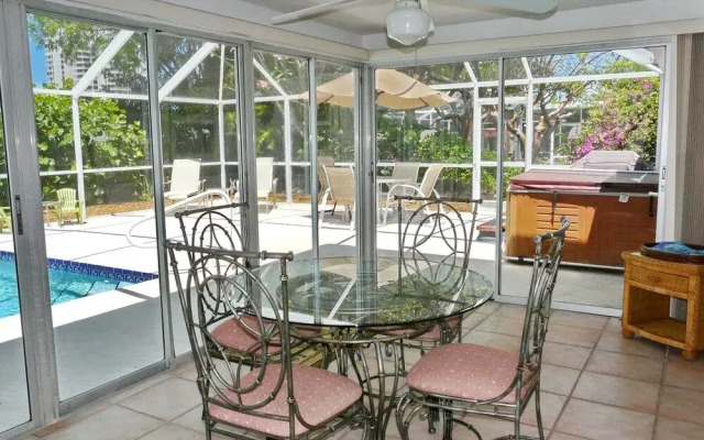 Cozy Home With Sunroom, Pool and Steps to Beach