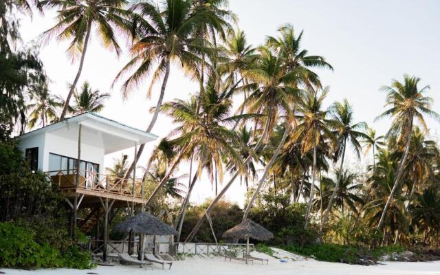 KIMA Serviced Beach House & Suites